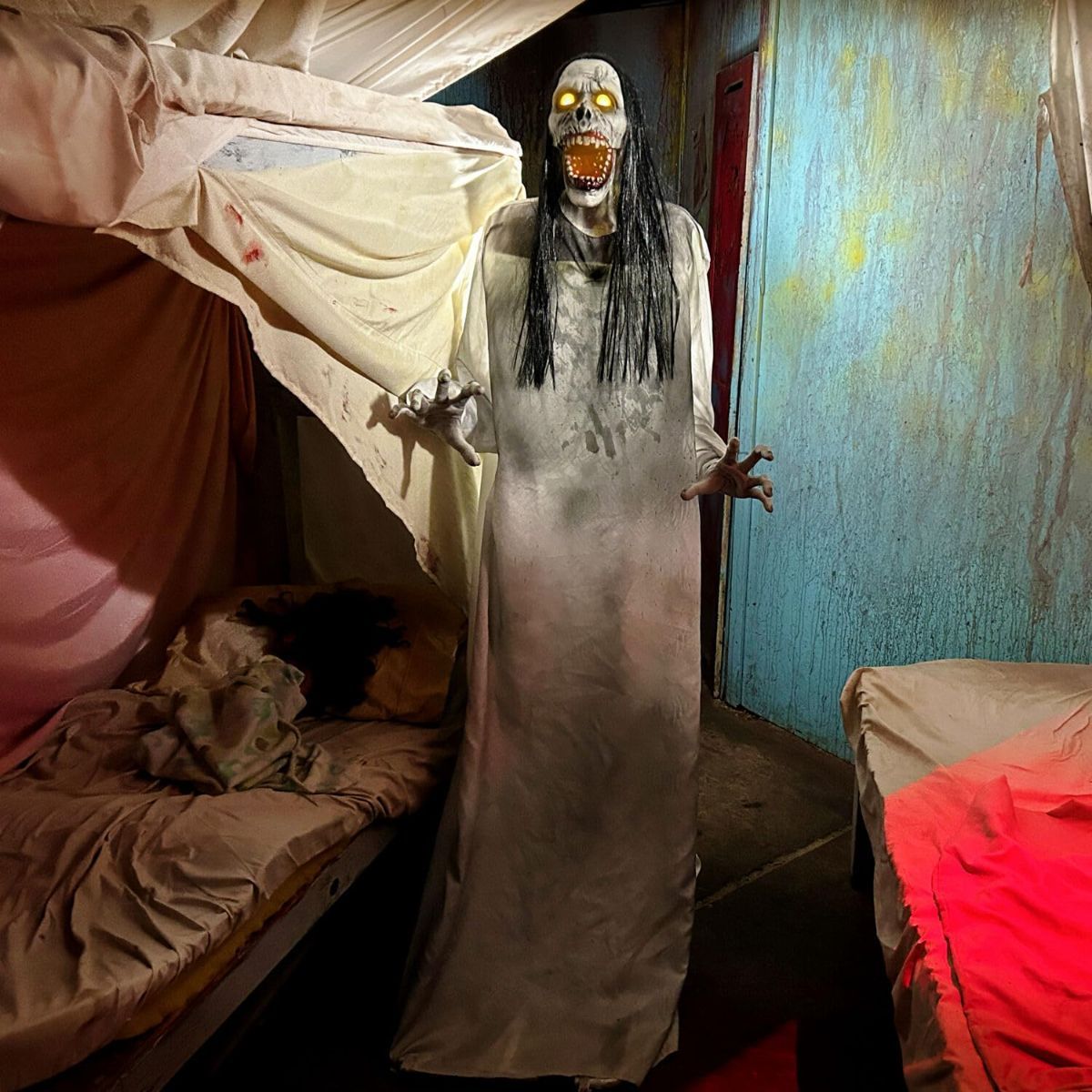 70.9in. Motion-Activated Animatronic Lurching Woman | 70.9In. Lurching Woman, Motion-Activated Lights and Sound, Indoor or Outdoor Creepy Decoration