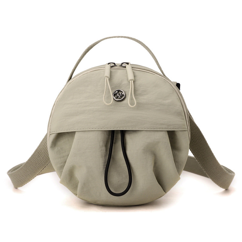Greyish green Fashionable Round Crossbody Bag with Water-Resistant Nylon and Multi-Pocket Design for Daily Travel Lightweight Hands-Free Storage Solution for Local Professionals