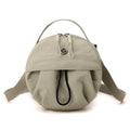 Greyish green Fashionable Round Crossbody Bag with Water-Resistant Nylon and Multi-Pocket Design for Daily Travel Lightweight Hands-Free Storage Solution for Local Professionals