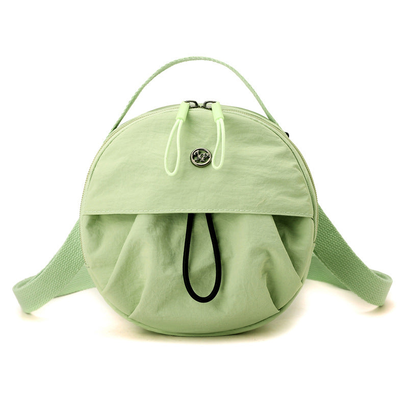 Green lemon Fashionable Round Crossbody Bag with Water-Resistant Nylon and Multi-Pocket Design for Daily Travel Lightweight Hands-Free Storage Solution for Local Professionals